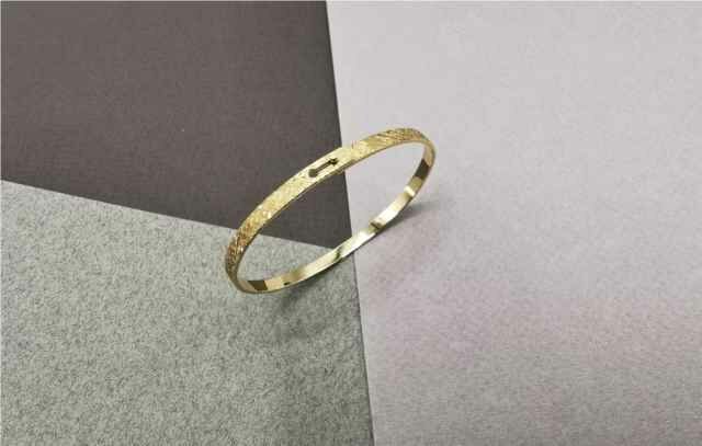 K-Créations - Or jaune 18 cts